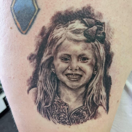 Explore boxing gloves tattoo ideas, creative tattoo ideas in Medina, available at Madhouse ink tattoo