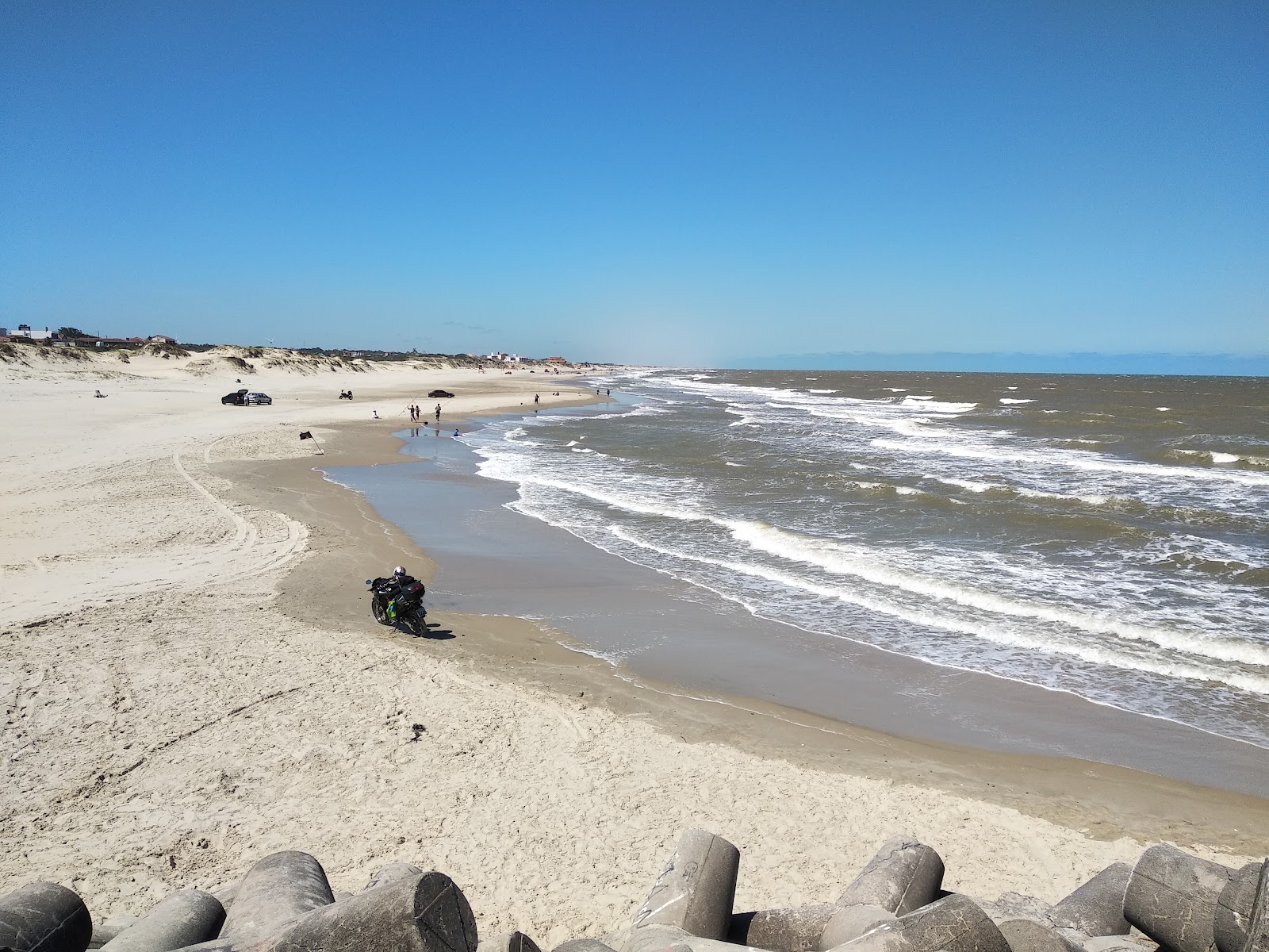 Fotografija Barra do Chui z svetel fin pesek površino