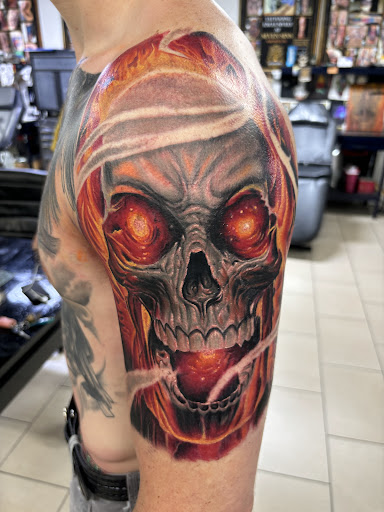 Explore side leg tattoo ideas, creative tattoo ideas in Sarasota, available at SEVEN SINS Tattoo Studio