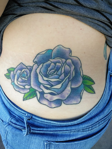 Explore anime hand tattoo ideas, creative tattoo ideas in Fort Worth, available at Twisted Ink