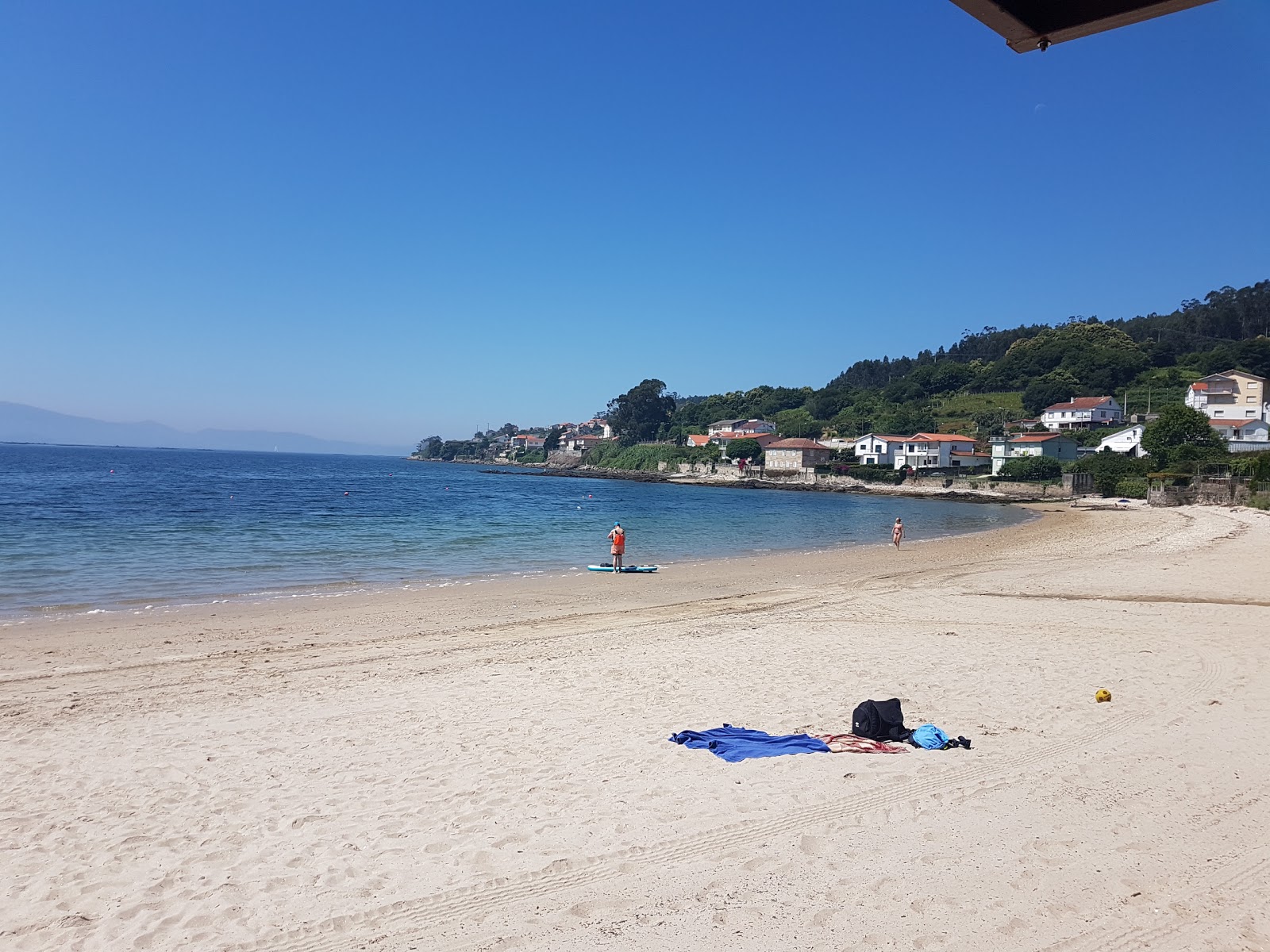 Foto di Praia Samieira con una superficie del sabbia bianca