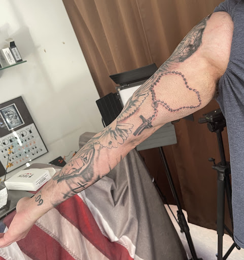 Explore rip tattoo ideas for females, creative tattoo ideas in Medina, available at Greasers Ink