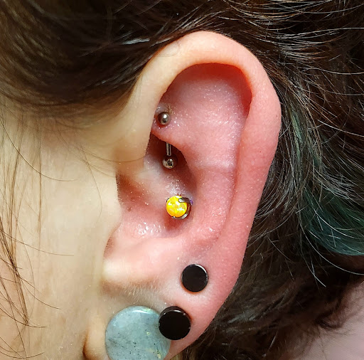 Find playboy bunny tattoo ideas for your next unique tattoo in Memphis at Rose Quartz Body Adornment LLC