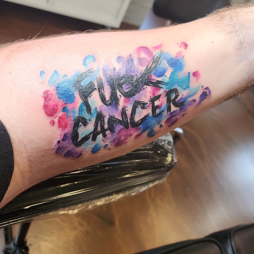 Explore tombstone movie tattoo ideas, creative tattoo ideas in South Haven, available at Sirens Rose