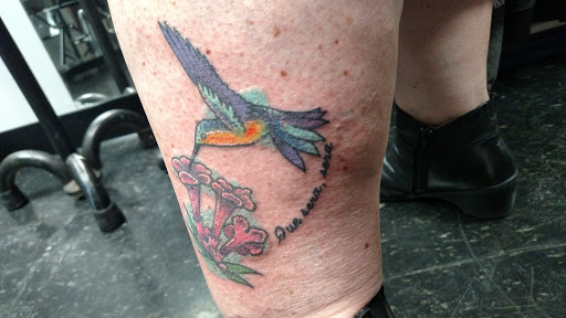 Explore electric guitar tattoo ideas, creative tattoo ideas in Madison, available at Ultimate Arts Tattoo