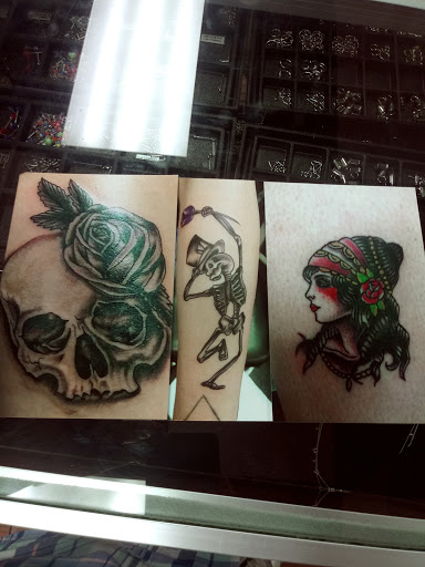 Explore cross tattoo ideas for men, creative tattoo ideas in San Antonio, available at Platinum Tattoos & Piercings