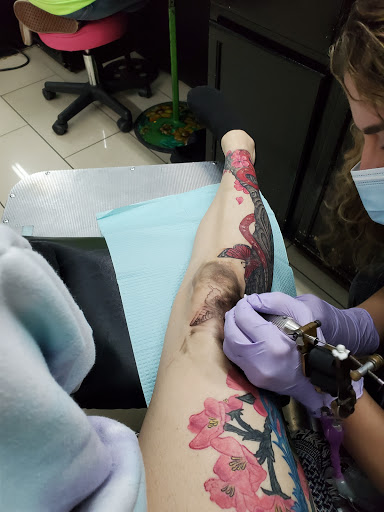 Explore half sleeve tattoo ideas male, creative tattoo ideas in San Antonio, available at Adrenaline Tattoo & Body Piercing