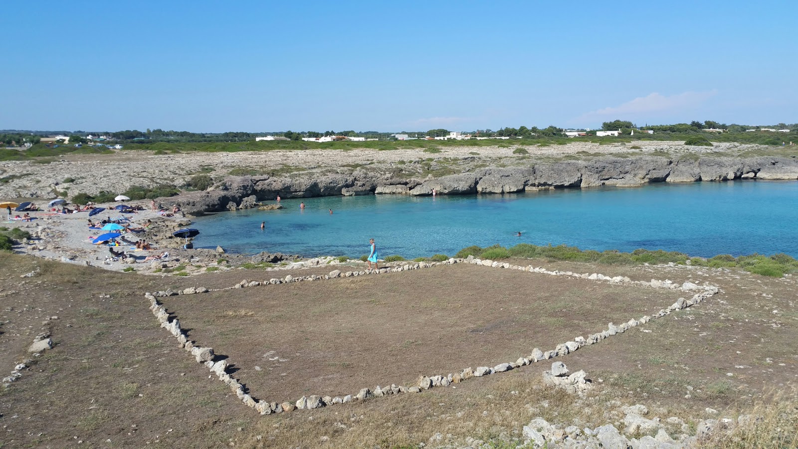 Torre Castiglione Beach'in fotoğrafı birden fazla küçük koy ile birlikte