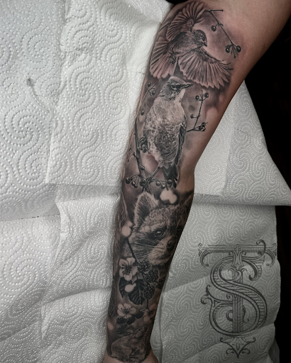 Explore bottom sleeve tattoo ideas, creative tattoo ideas in Lakeview, available at Backwoods Tattoo Studio