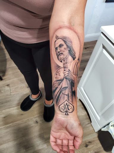 Explore mother and child tattoo ideas, creative tattoo ideas in Fresno, available at Happy Client Tattoo