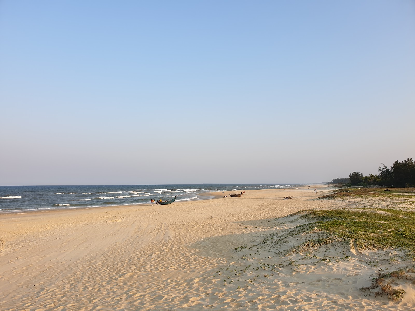 Fotografija Ha Thanh Beach z dolga ravna obala