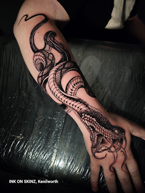 (Ink On Skinz Tattoo and piercing Studio)