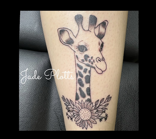 Explore back arm tattoo ideas for guys, creative tattoo ideas in Lewisburg, available at Jolie Femme Permanent Makeup & Tiny Tattoos