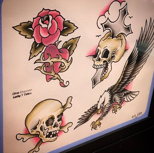 Explore cover up lower back tattoo ideas, creative tattoo ideas in Libertyville, available at Lucky Seven Tattoo
