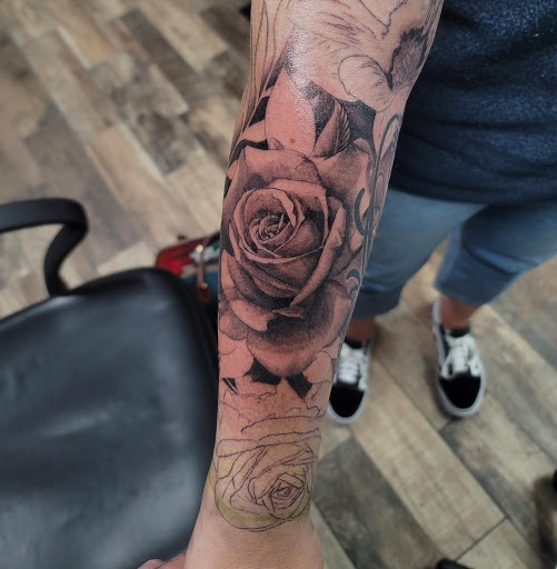 Explore snake tattoo ideas for females, creative tattoo ideas in Burlington, available at Mr Tattoos & Piercing