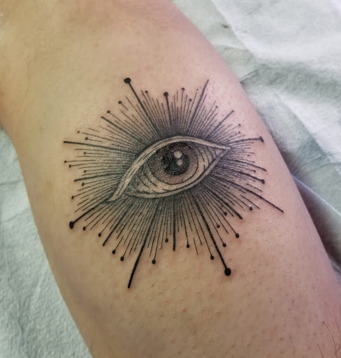 Explore ball python tattoo ideas, creative tattoo ideas in Amherst, available at Apothecary Tattoo