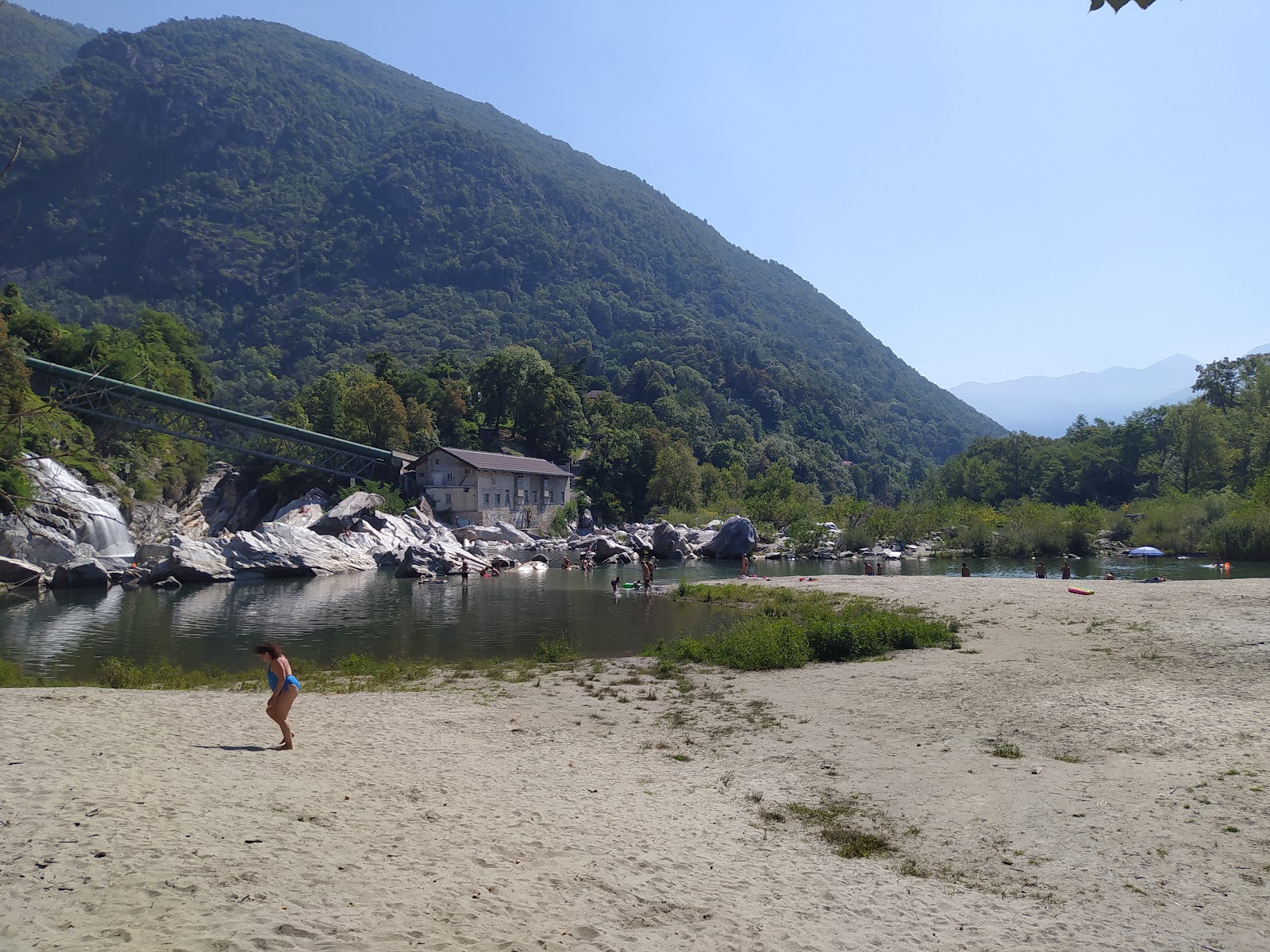 Photo of Spiaggia Pozzo di Tegna and the settlement