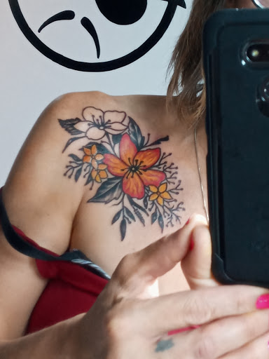 Explore infinity couple tattoo ideas, creative tattoo ideas in Orange Park, available at All Aces Tattoo and Body Piercing LLC