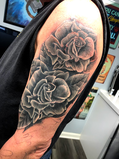 Explore tattoo cover up ideas on leg, creative tattoo ideas in Greenfield, available at Tattoos In Time Studio