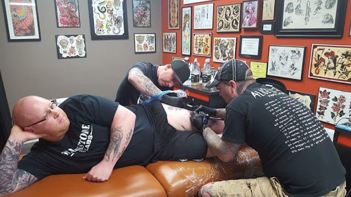 Explore female dragon tattoo ideas, creative tattoo ideas in Gadsden, available at Sacred Art Tattoo Company