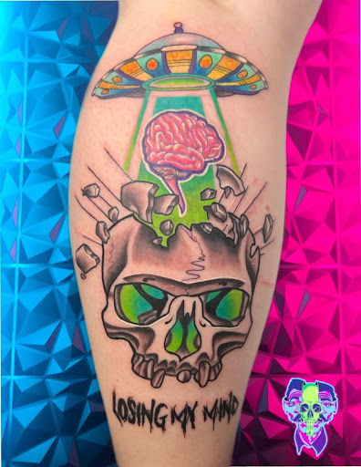 Find in between breast tattoo ideas for your next unique tattoo in Bethlehem at Soul Glow Electric Ink