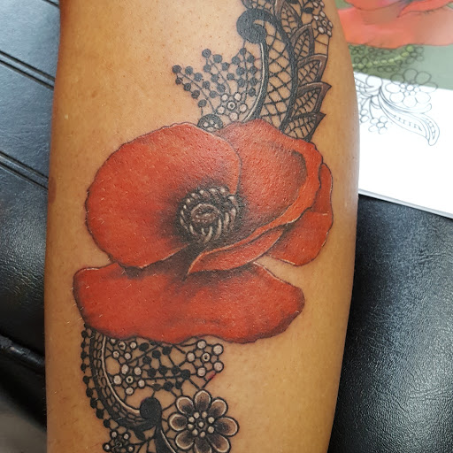 Explore 1983 tattoo ideas, creative tattoo ideas in Huntsville, available at The Purple Goat Tattoos