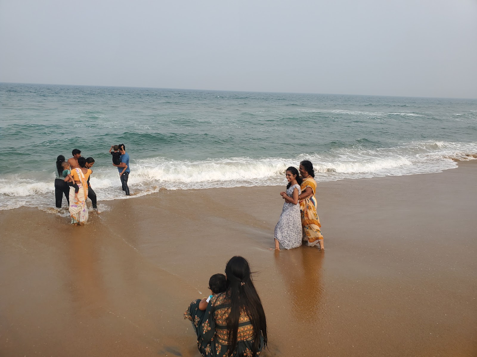 Fotografija Thiruvidanthai Beach z turkizna voda površino