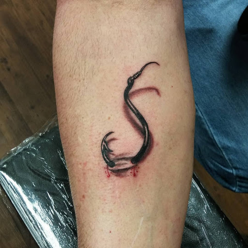 Explore tombstone tattoo ideas, creative tattoo ideas in Warsaw, available at Mosthigh Tattoos & Body Piercings