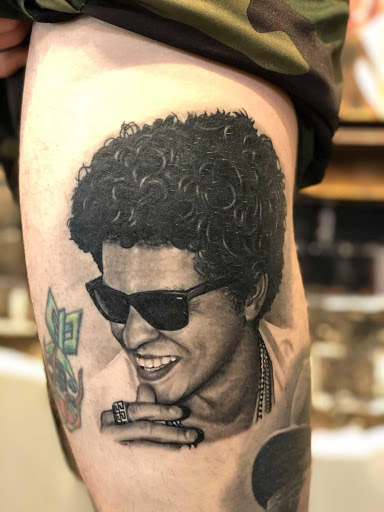 Explore family portrait tattoo ideas, creative tattoo ideas in Baraboo, available at Gold Leaf Tattoo Collective and Art Gallery