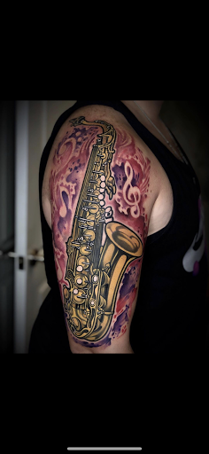 Explore scroll tattoo ideas, creative tattoo ideas in West Palm Beach, available at Water Street Tattoo Inc