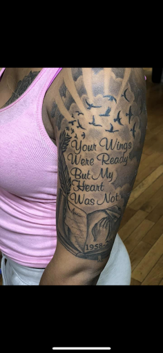 Explore penguin tattoo ideas, creative tattoo ideas in Jamaica, available at Rising Phoenix Ink