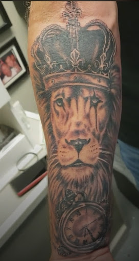 Explore fighter tattoo ideas, creative tattoo ideas in Inman, available at Nine Lives Tattoo