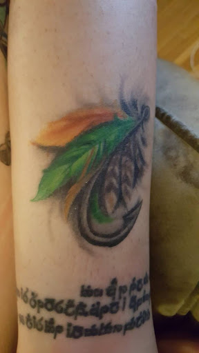 Explore small floral tattoo ideas, creative tattoo ideas in Johnson City, available at Defiant Designs