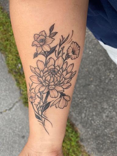 Explore traditional elbow tattoo ideas, creative tattoo ideas in Peckville, available at Silver Fox Tattoos