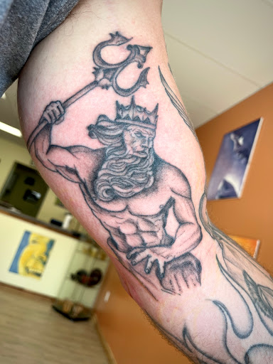 Explore horizontal tattoo ideas, creative tattoo ideas in Utica, available at Modern Primitive Tattoo