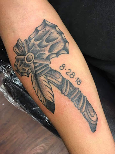 Explore marine corp tattoo ideas, creative tattoo ideas in Powell, available at Against All Odds Tattoos and Piercings