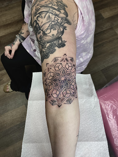 Explore script tattoo ideas for guys, creative tattoo ideas in Lake City, available at Crooked Spines Tattoo Studio