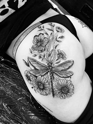 Find tattoo ideas with letters for your next unique tattoo in Seymour at American Gypsy Tattoo Corp.