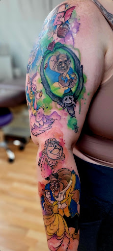 Explore comic book tattoo ideas, creative tattoo ideas in Benton, available at Spectrum Tattoo