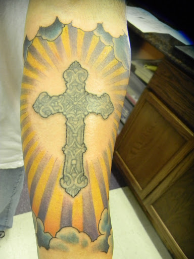 Explore tattoo ideas for women's legs, creative tattoo ideas in Galveston, available at The Tattoo Shop
