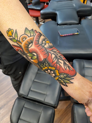 Explore gay couple tattoo ideas, creative tattoo ideas in Pineville, available at Epic Ink Studio