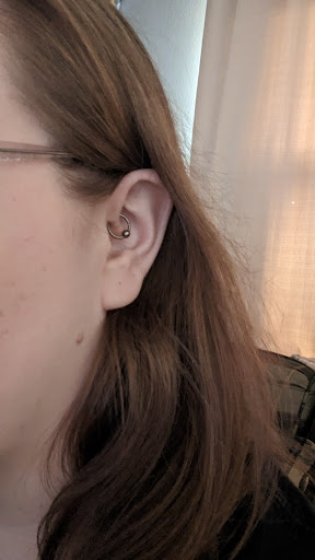 Explore cover up tattoo ideas black, creative tattoo ideas in Saint Paul, available at Hail Mary Piercing