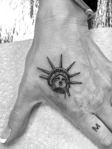 Explore cute spine tattoo ideas, creative tattoo ideas in Los Alamitos, available at Mr. Inkwells Classy Tattoos