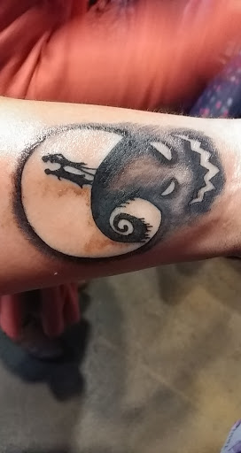 Find under breast tattoo ideas for your next unique tattoo in Lexington at Fallen Angel Tattoo Studio llc