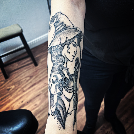 Explore wrist name tattoo ideas, creative tattoo ideas in Cocoa, available at Rorschach Tattoo Shop and Piercing Studio