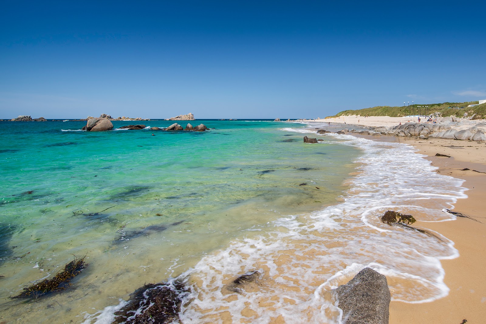 Photo de Plage De Reve avec sable lumineux de surface