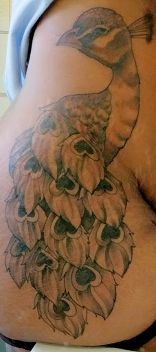 Tattoo Shop «Ink AddiXion Tattoo Studio», reviews and photos, 3400 Troost Ave, Kansas City, MO 64109, USA