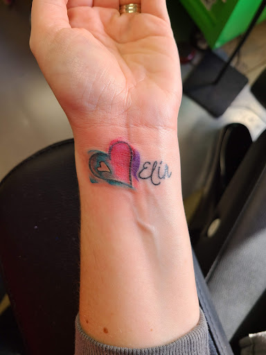 Explore reading tattoo ideas, creative tattoo ideas in Seymour, available at Popseys Electric Tattooing Co.