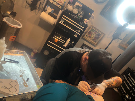 Explore knee tattoo ideas for men, creative tattoo ideas in Fort Wayne, available at Grade A Tattoos and Body Piercing