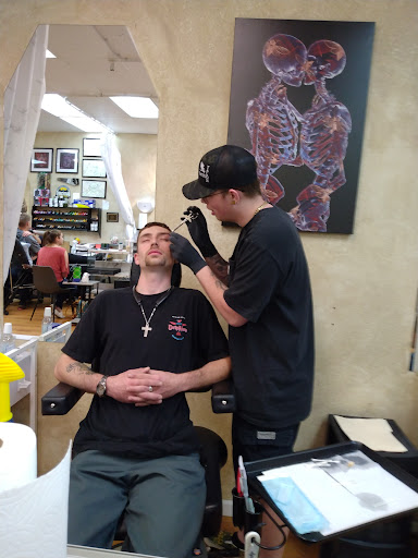 Explore pansy tattoo ideas, creative tattoo ideas in Garden City, available at Talon Tattoo Co